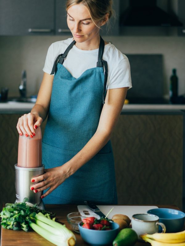 young-wellness-woman-preparing-a-nutritious-healthy-breakfast-in-her-kitchen-.jpg young-wellness-woman-preparing-a-nutritious-healthy-breakfast-in-her-kitchen-.jpg